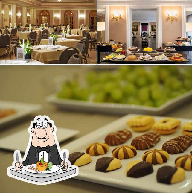 This is the image depicting food and interior at Ambasciatori Place Hotel