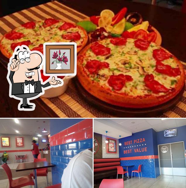 Vérifiez la photo représentant la intérieur et pizza concernant Roman's Pizza Phumulani Mall