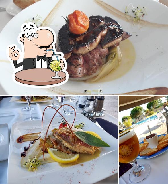 Las imágenes de bebida y comida en Hôtel Restaurant Sous Les Pins