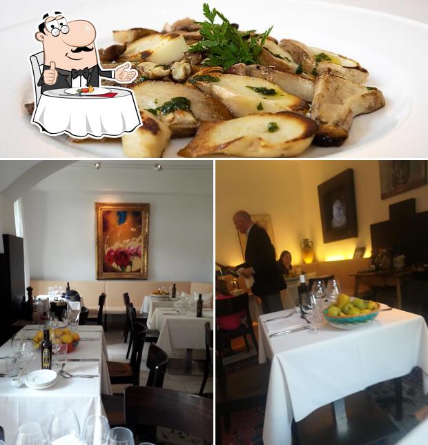 Guarda la foto che presenta la tavolo da pranzo e cibo di Oberwirt Am Gries