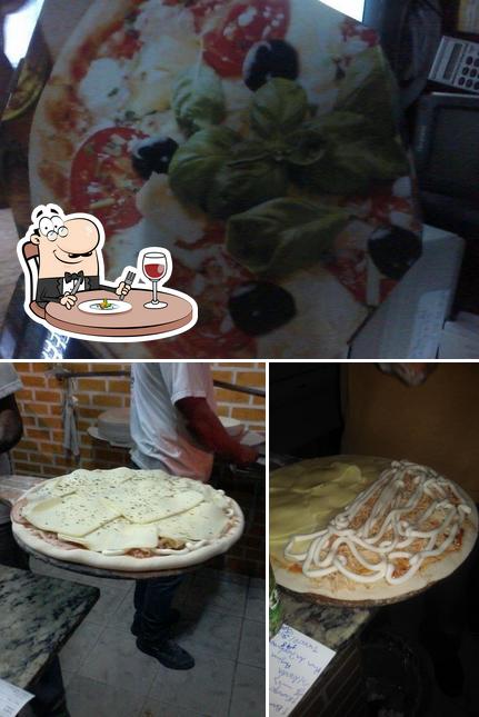 Comida em Pizzaria Neres