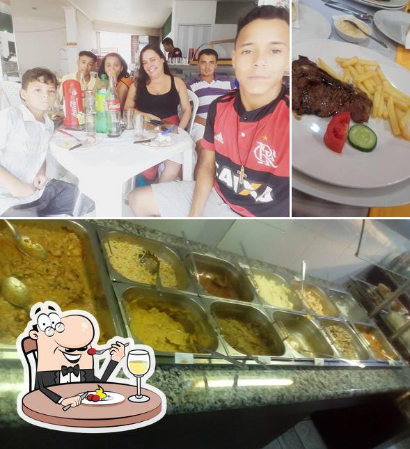 Entre diferentes coisas, comida e mesa de jantar podem ser encontrados a Restaurante Catedral De Itabuna