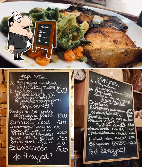 Взгляните на эту фотографию, где видны доска для меню и еда в Belvárosi Disznótoros - Károlyi utca