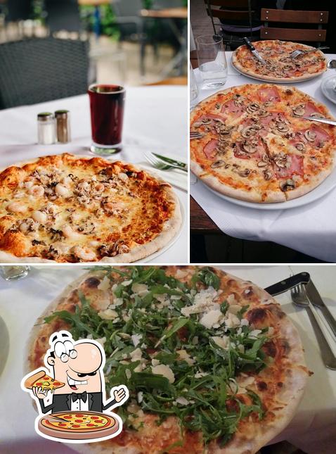 Pick pizza at Pizzeria Roma