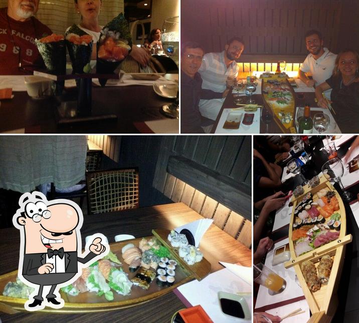 Confira a foto mostrando interior e mesa de jantar no Sakura Restaurante
