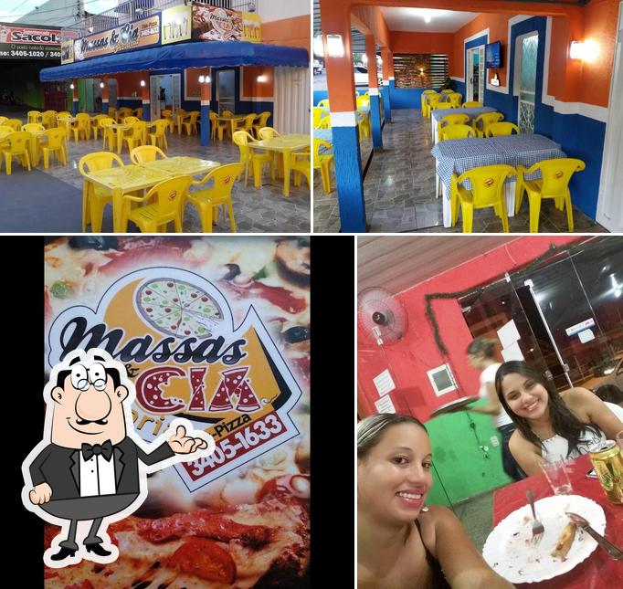 A foto da interior e comida a Massas & Cia Pizzaria