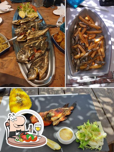 Order seafood at Paillote Cala d'Orzu Chez Eric