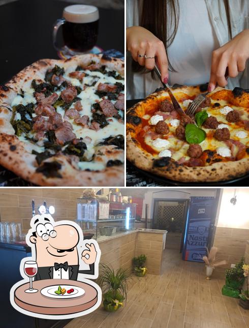 Tra le varie cose da Old Style Pizzeria e Girarrosto si possono trovare la cibo e interni