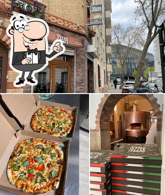 Among different things one can find exterior and pizza at Pizza Ottima's - Au Feu de Bois