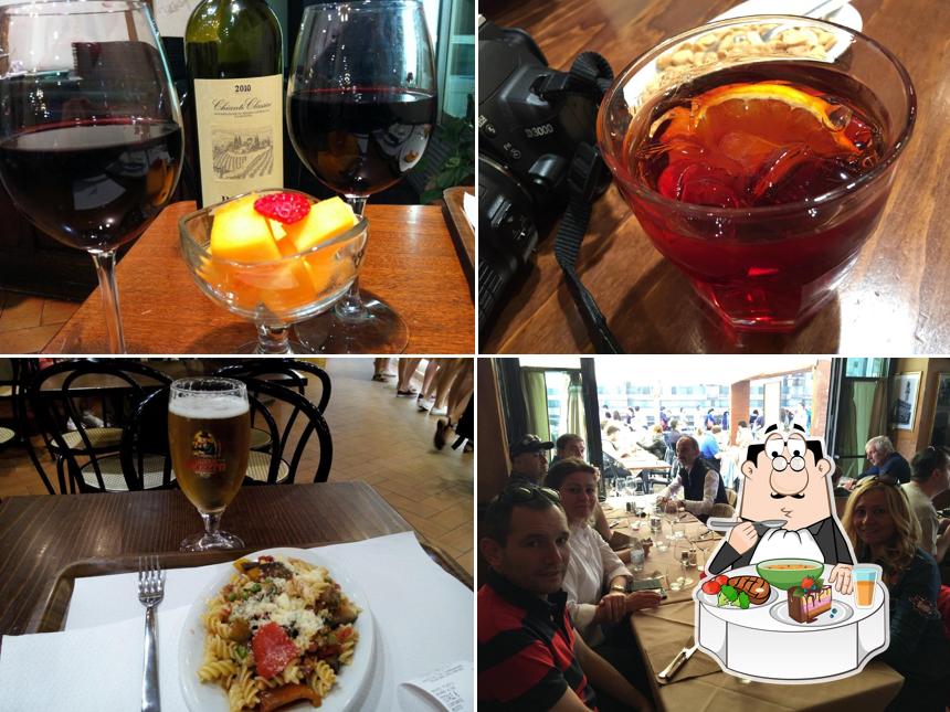 Dai un’occhiata alla foto che mostra la tavolo da pranzo e bevanda di Bar Ristorante Queen Victoria