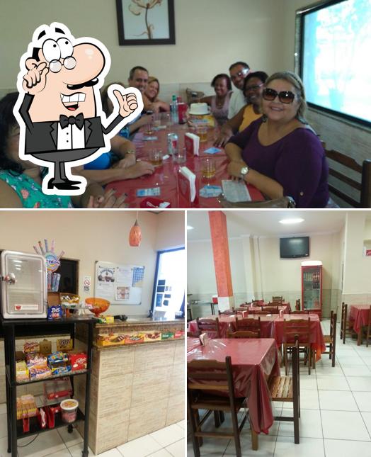 Entre diferentes coisas, interior e mesa de jantar podem ser encontrados no Recanto do Sabor Restaurante