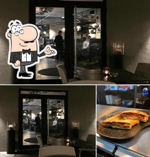 L’image de la intérieur et table à manger concernant Aïan's Restaurant Sàrl