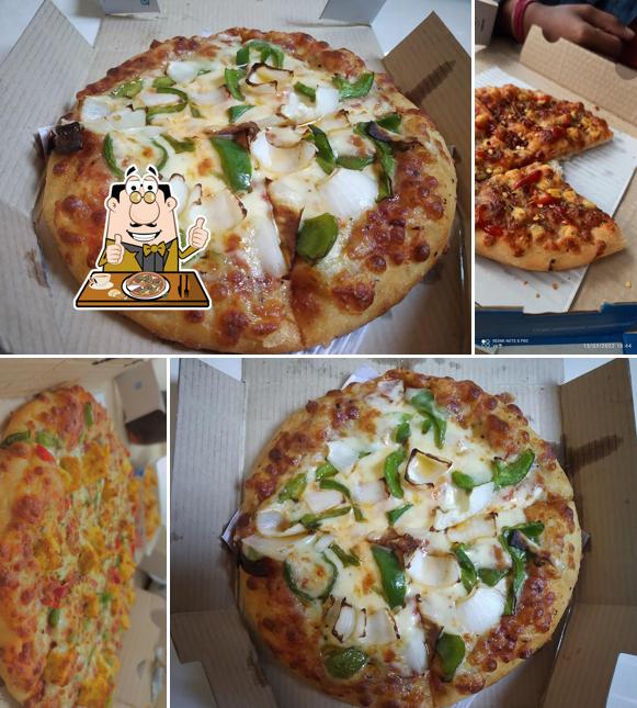 Pick pizza at Domino's Pizza