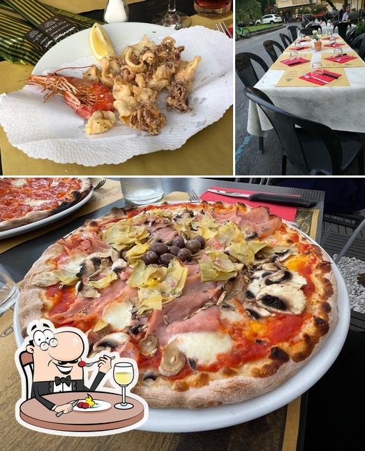 La immagine della cibo e tavolo da pranzo di Pizzeria Sant'Ampelio