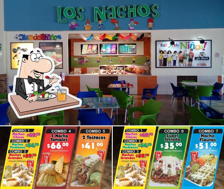 Take a look at the photo displaying food and interior at Los Nachos Plaza Centenario