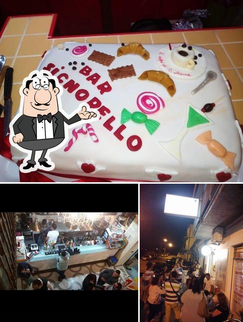 La immagine di interni e torta da Bar Ricevitoria Signorello