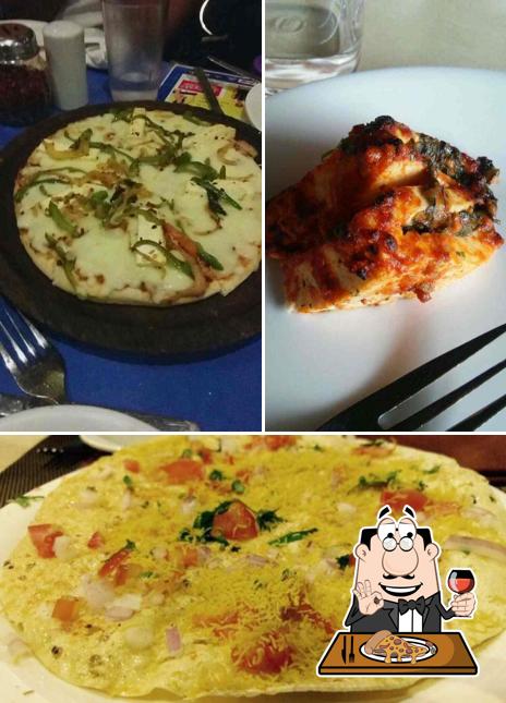 Pick pizza at Utsav Delight Dining & Bar