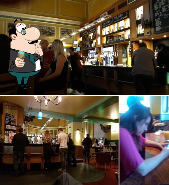 Take a look at the photo showing bar counter and beverage at The City & County - JD Wetherspoon