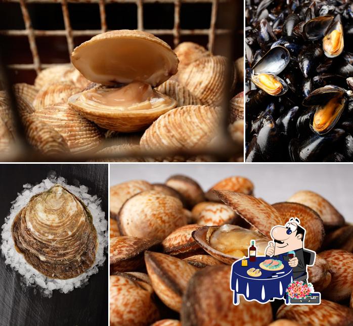 Essayez de nombreux plats à base de fruits de mer servis par Le Comptoir Saint Kerber