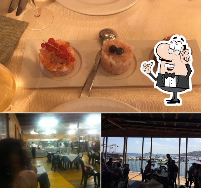 Guarda la immagine che mostra la interni e cibo di Ristorante La Terrazza Sul Mare