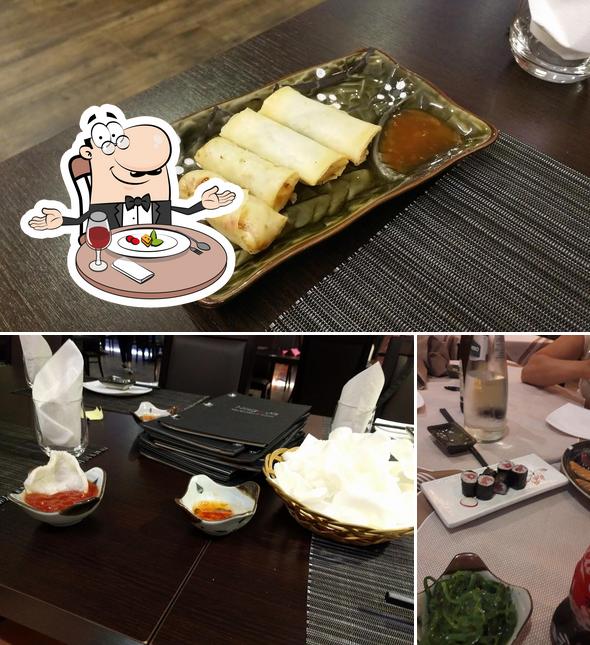 La foto della tavolo da pranzo e cibo di Nagoya Restaurant sushi
