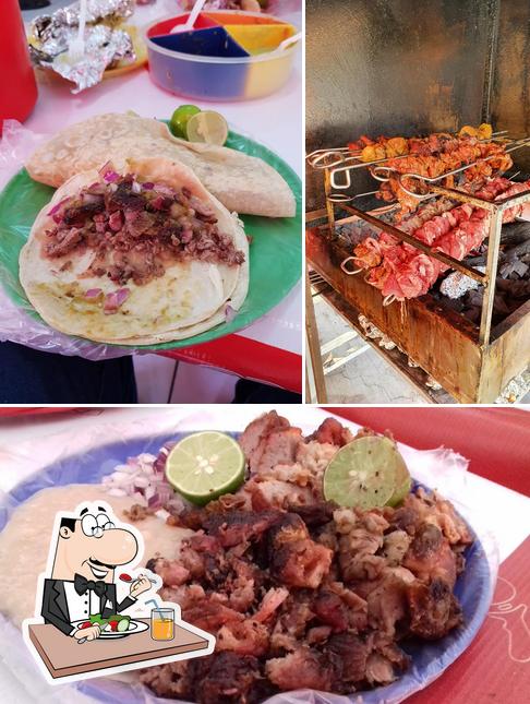 Food at Tacos De Carne Asada Y Ubre El Brochetas