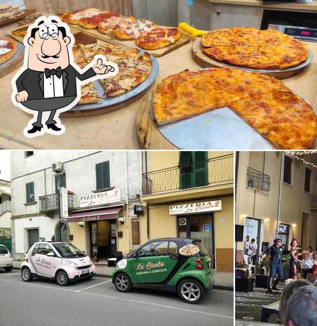 Tra le varie cose da Pizzeria La Cicala 2 si possono trovare la interni e pizza