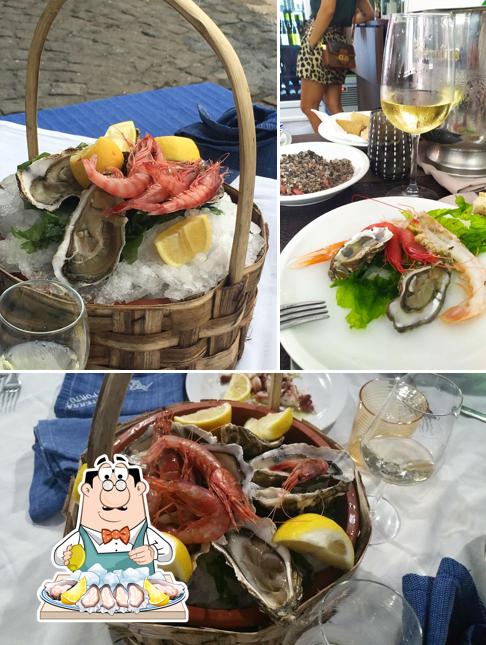 Essayez des fruits de mer à La Lanterna del Porto