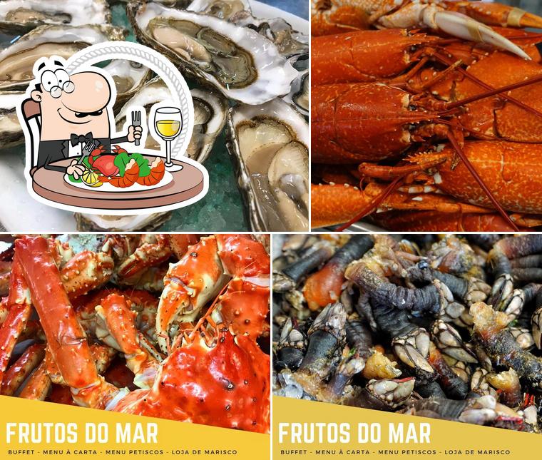 Try out various seafood meals served at Frutos Mar