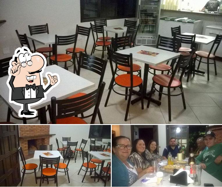 O interior do Pizzaria 224