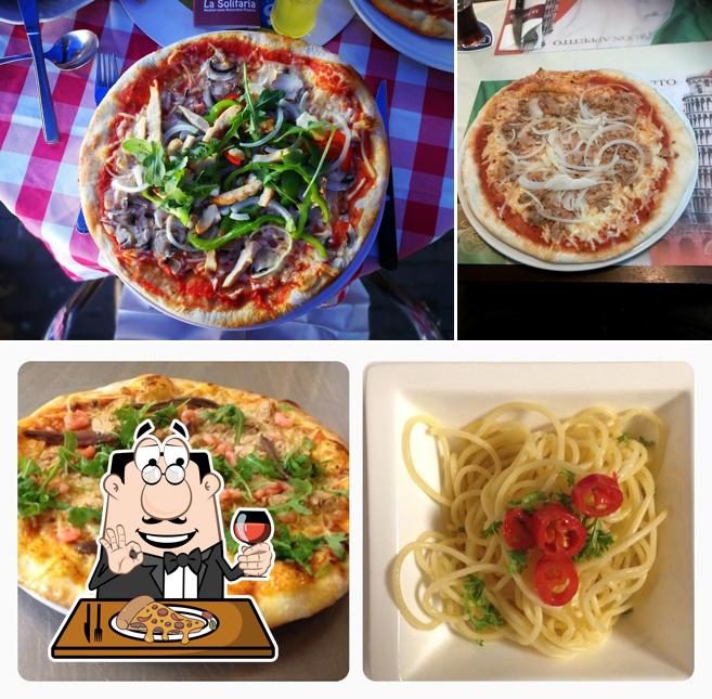 Try out pizza at La Solitaria Italiaans Restaurant