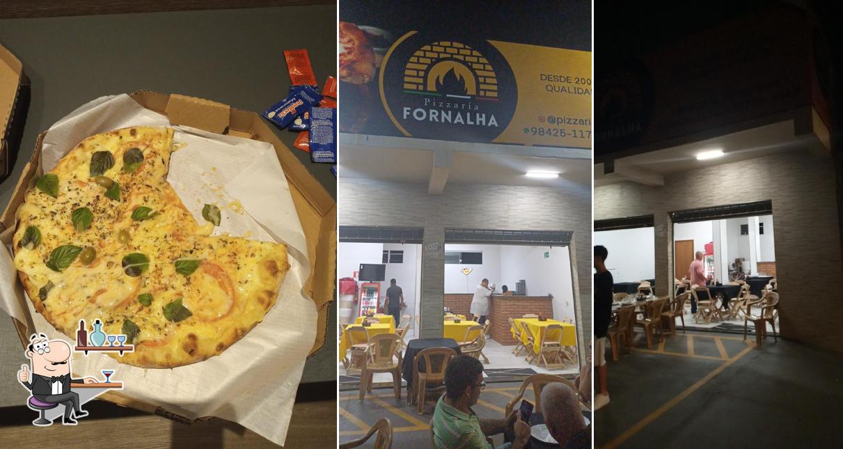 O interior do Pizzaria Fornalha Udi