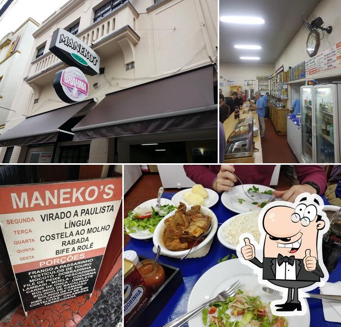 Look at the image of Maneko's Bar