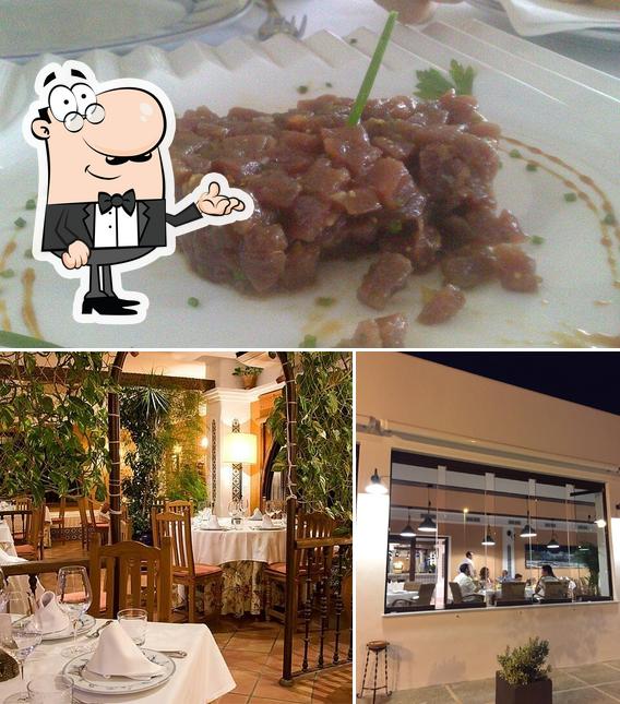 Mira las fotografías que muestran interior y comida en Restaurante El Rezon