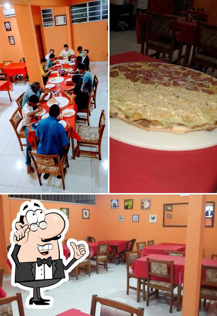 O interior do Pizzaria Fernandes e Cia