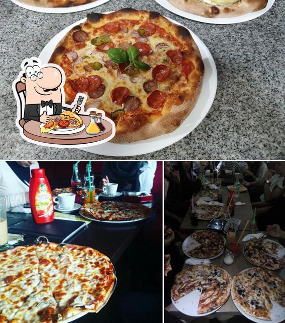 Pick pizza at Restaurantul Champions