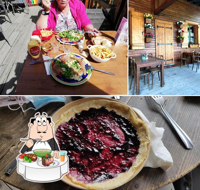 Parmi les différentes choses de la table à manger et la gâteau, une personne peut trouver sur Chalet du Glacier des Bossons