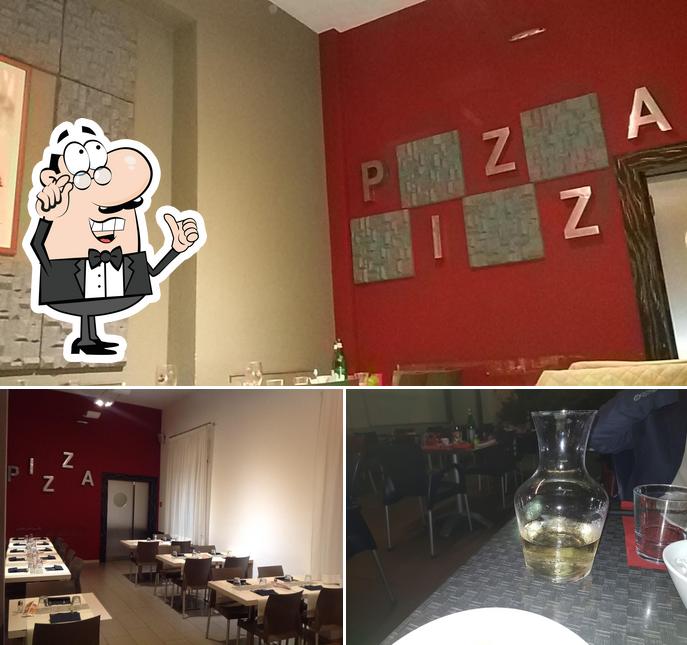 Dai un'occhiata agli interni di Pizzeria Il Gallo