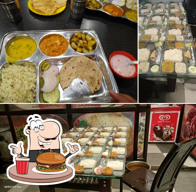 Get a burger at Vrindavan Restaurant Food Delivery In Train At Jhansi Station