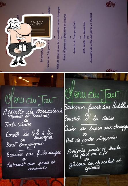 Check out the image showing blackboard and exterior at L'Auberge Du Colvert