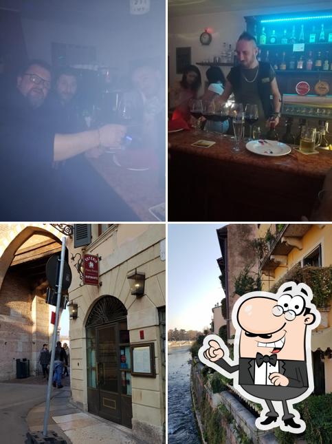 La immagine della esterno e bancone da bar di Osteria Ponte di Pietra