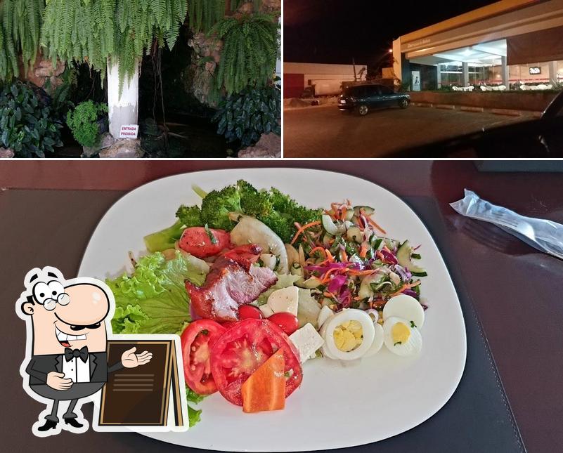 A imagem do Churrascaria Nostra Carne’s exterior e comida