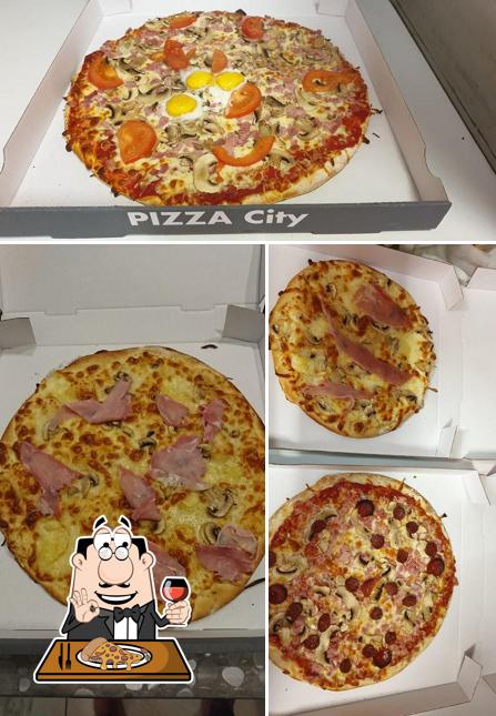 Essayez des pizzas à Pizza City Carvin