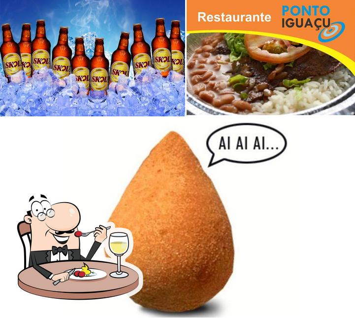 Esta é a ilustração apresentando comida e cerveja no Restaurante Ponto Iguaçu