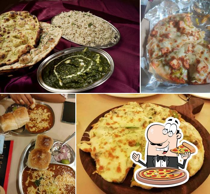 Pick pizza at Navtara Veg Restaurant