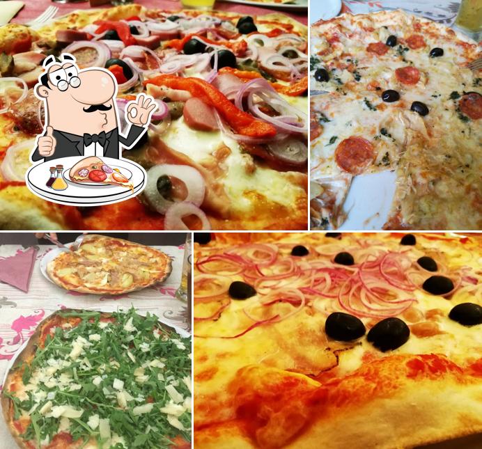 A Bar Pizzeria La Perla, puoi goderti una bella pizza