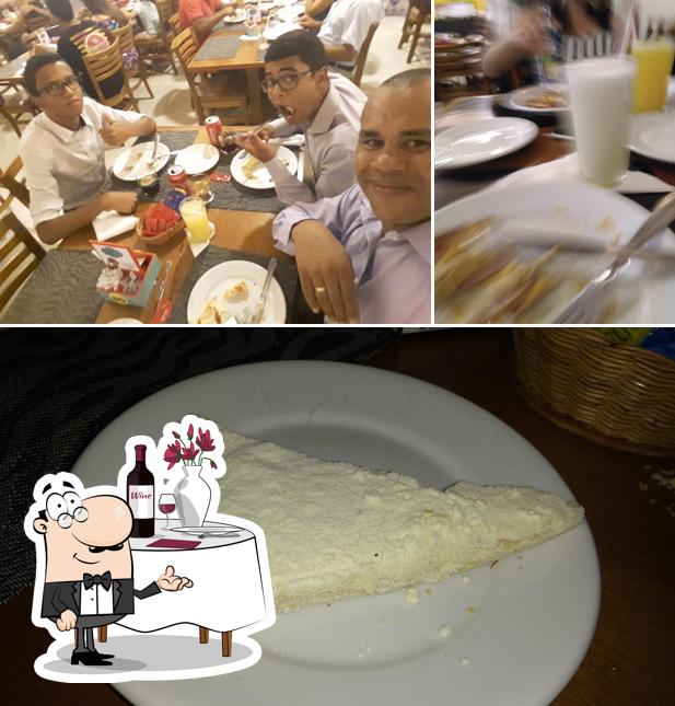 A foto da mesa de jantar e comida no Pizzaria Zebu Rodízio de Pizzas e Massas