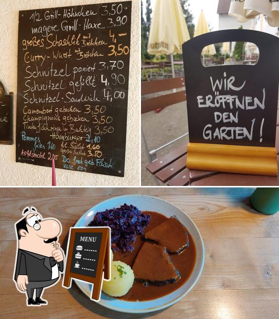 The image of blackboard and food at Gasthof Drei Linden