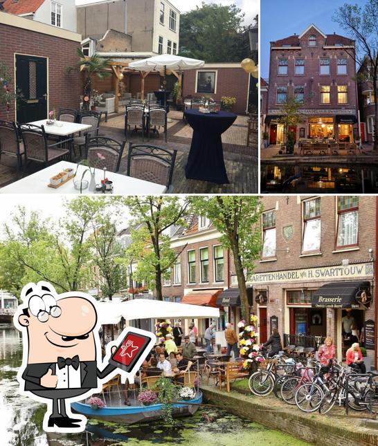 Jetez un coup d’oeil à l’image indiquant la extérieur et table à manger concernant Hotel Johannes Vermeer
