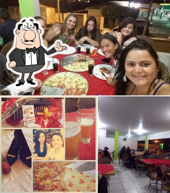 O interior do Pizza & Pizza Pizzaria